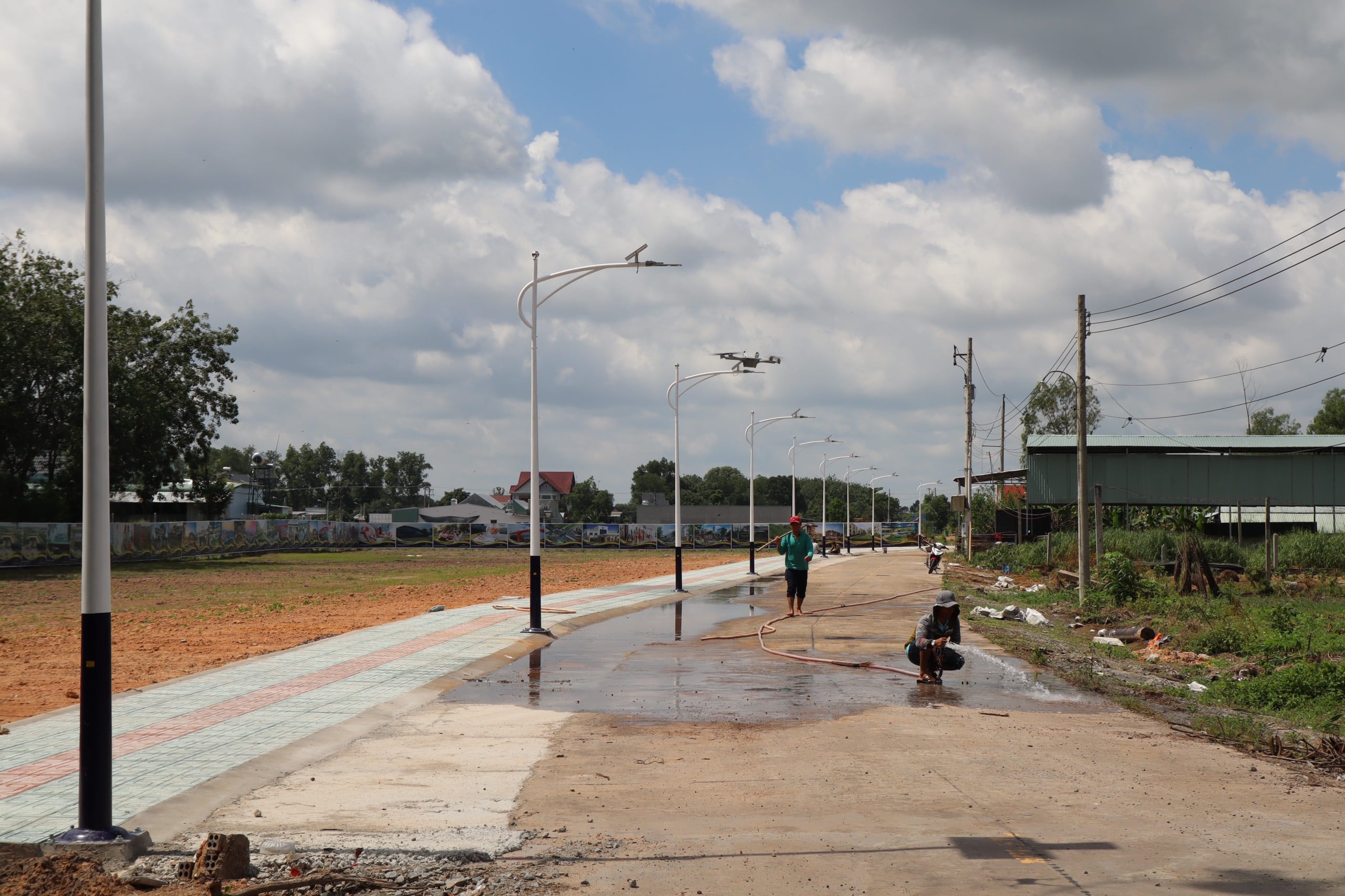 Ảnh thực tế khu đất Bàu Bàng Central Land với hạ tầng hoàn thiện khu dân cư đông đúc liền kề chợ Trừ Văn Thố